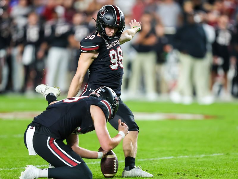 Nov 18, 2023; Columbia, South Carolina, USA; South Carolina Gamecocks place kicker Mitch Jeter (98) makes a field goal against the Kentucky Wildcats in the first quarter at Williams-Brice Stadium. Mandatory Credit: Jeff Blake-USA TODAY Sports Kentucky