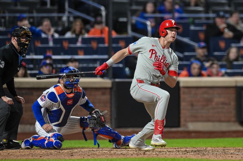 Apr 21, 2025; New York City, New York, USA; Philadelphia Phillies outfielder Max Kepler (17) hits a double against the New York Mets during the ninth inning at Citi Field. Mandatory Credit: John Jones-Imagn Images