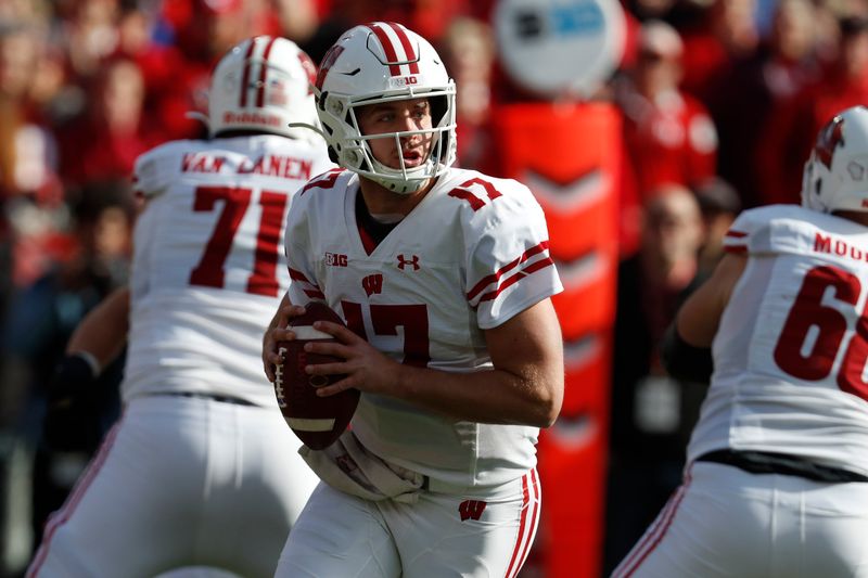 Nov 16, 2019; Lincoln, NE, USA; Wisconsin Badgers quarterback Jack Coan (17) throws against the Nebraska Cornhuskers in the first half at Memorial Stadium. Mandatory Credit: Bruce Thorson-USA TODAY Sports