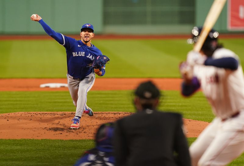 Apr 7, 2025; Boston, Massachusetts, USA; Toronto Blue Jays pitcher José Berríos (17) throws a pitch against the Boston Red Sox in the first inning at Fenway Park. Mandatory Credit: David Butler II-Imagn Images