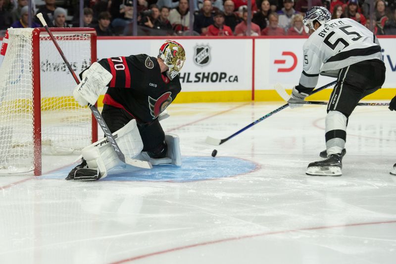 Nov 2, 2023; Ottawa, Ontario, CAN; Los Angeles Kings right wing Quinton Byfeld (55) shoots on Ottawa Senators goalie Joonas Korpisalo (70) in the second period at the Canadian Tire Centre. Mandatory Credit: Marc DesRosiers-USA TODAY Sports