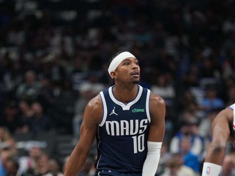 DALLAS, TX - MARCH 16: Brandon Williams #10 of the Dallas Mavericks dribbles the ball during the game against the Philadelphia 76ers on March 16, 2025 at American Airlines Center in Dallas, Texas. NOTE TO USER: User expressly acknowledges and agrees that, by downloading and or using this photograph, User is consenting to the terms and conditions of the Getty Images License Agreement. Mandatory Copyright Notice: Copyright 2025 NBAE (Photo by Glenn James/NBAE via Getty Images)