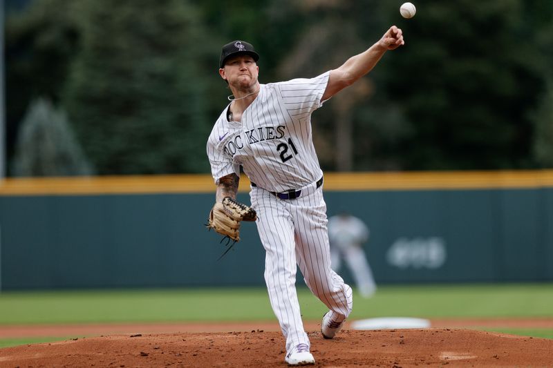 Aug 11, 2024; Denver, Colorado, USA; Colorado Rockies pitcher Kyle Freeland (21) pitches in the first inning against the Atlanta Braves at Coors Field. Mandatory Credit: Isaiah J. Downing-USA TODAY Sports