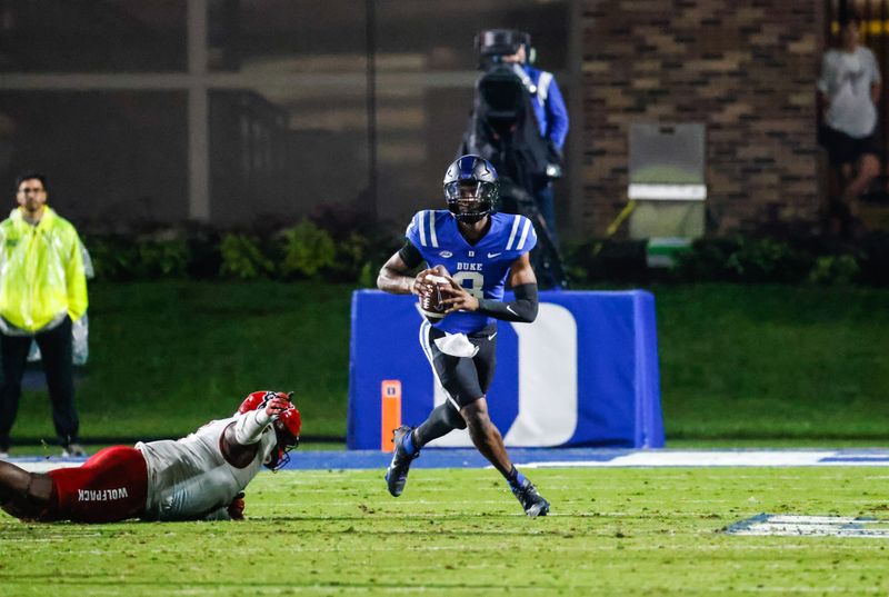 Oct 14, 2023; Durham, North Carolina, USADuke Blue Devils quarterback Henry Belin IV (3) prepares to throw the ball during the second half of the game against North Carolina State Wolfpack at Wallace Wade Stadium. Mandatory Credit: Jaylynn Nash-USA TODAY Sports