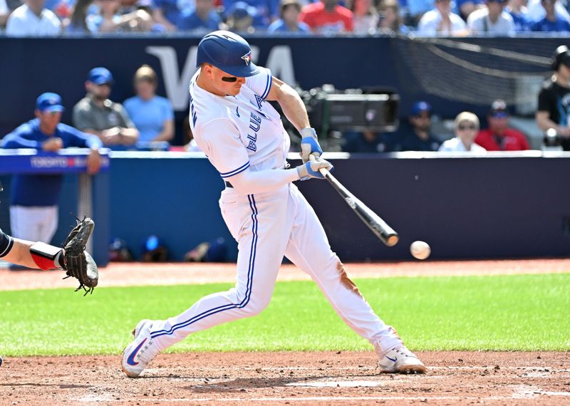 May 13, 2023; Toronto, Ontario, CAN; Toronto Blue Jays third baseman Matt Chapman (26) hits a single against the Atlanta Braves in the fourth inning at Rogers Centre. Mandatory Credit: Dan Hamilton-USA TODAY Sports