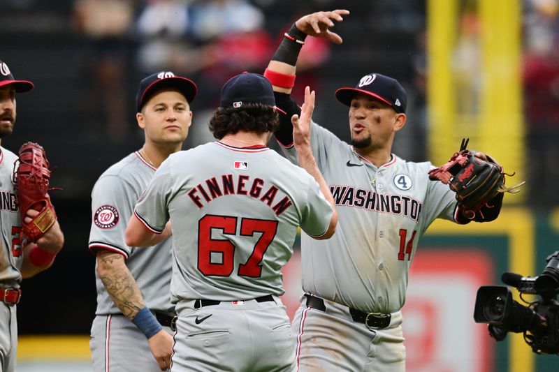 Jun 2, 2024; Cleveland, Ohio, USA; Washington Nationals relief pitcher Kyle Finnegan (67) celebrates with shortstop Ildemaro Vargas (14) after the Nationals beat the Cleveland Guardians at Progressive Field. Mandatory Credit: Ken Blaze-USA TODAY Sports