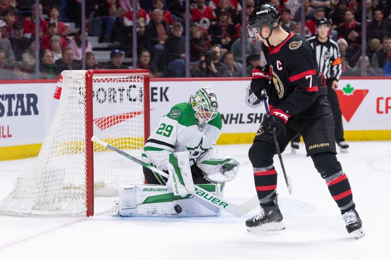 Feb 22, 2024; Ottawa, Ontario, CAN; Dallas Stars goalie Jake Oettinger 929) makes a save in front of Ottawa Senators left wing Brrady Tkachuk (7) in the first period at the Canadian Tire Centre. Mandatory Credit: Marc DesRosiers-USA TODAY Sports