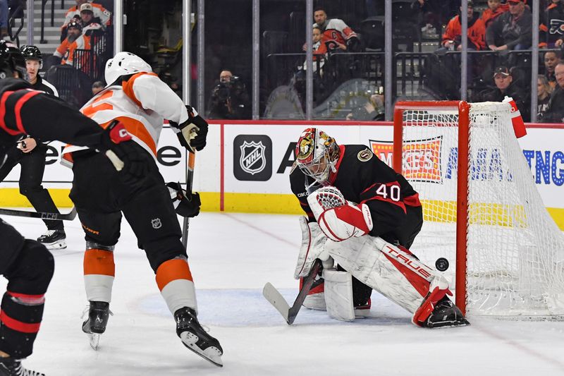 Mar 2, 2024; Philadelphia, Pennsylvania, USA;  Ottawa Senators goaltender Mads Sogaard (40) makes a save against Philadelphia Flyers left wing Joel Farabee (86) during the first period at Wells Fargo Center. Mandatory Credit: Eric Hartline-USA TODAY Sports