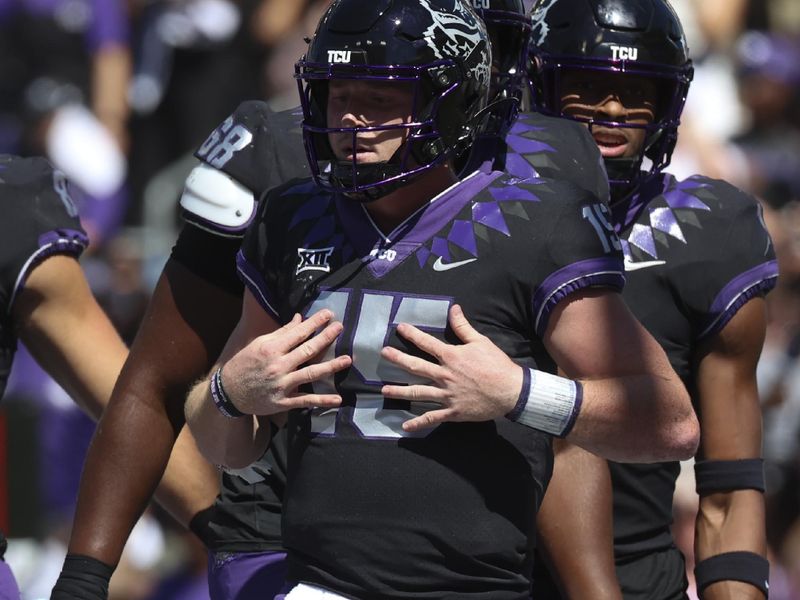 Oct 1, 2022; Fort Worth, Texas, USA;  TCU Horned Frogs quarterback Max Duggan (15) celebrates after scoring a touchdown during the second half against the Oklahoma Sooners at Amon G. Carter Stadium. Mandatory Credit: Kevin Jairaj-USA TODAY Sports