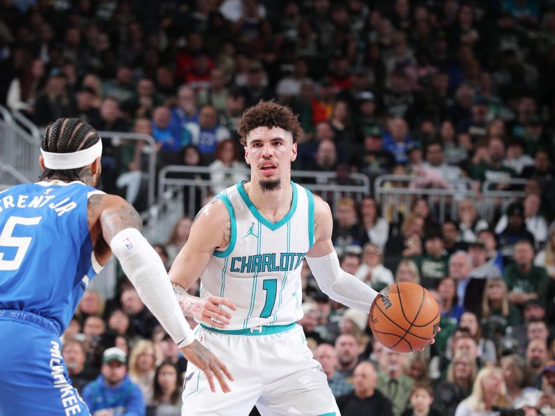 MILWAUKEE, WI - NOVEMBER 23: LaMelo Ball #1 of the Charlotte Hornets dribbles the ball during the game against the Milwaukee Bucks on November 23, 2024 at the Fiserv Forum Center in Milwaukee, Wisconsin. NOTE TO USER: User expressly acknowledges and agrees that, by downloading and or using this Photograph, user is consenting to the terms and conditions of the Getty Images License Agreement. Mandatory Copyright Notice: Copyright 2024 NBAE (Photo by Gary Dineen/NBAE via Getty Images).