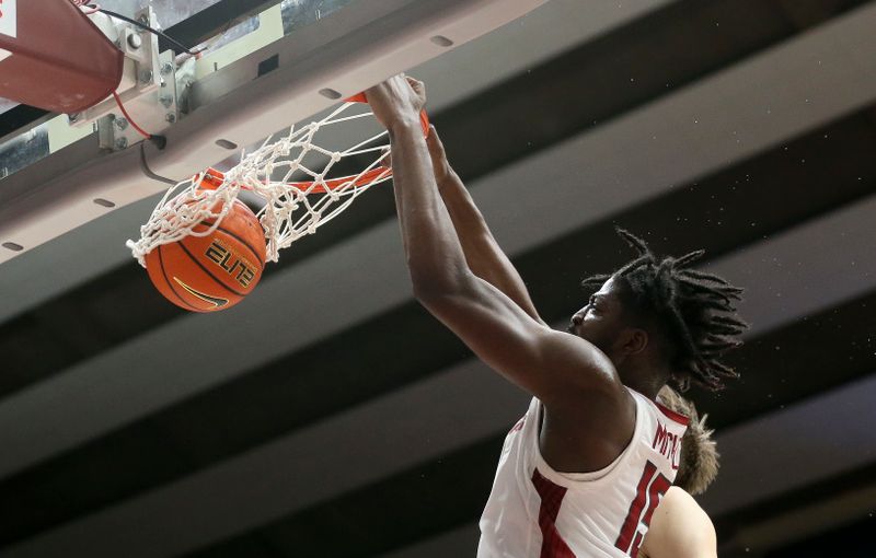 Mar 9, 2024; Tuscaloosa, Alabama, USA;  Arkansas forward Makhi Mitchell (15) slams home a dunk against Alabama at Coleman Coliseum. Alabama came from behind to win on overtime 92-88. Mandatory Credit: Gary Cosby Jr.-USA TODAY Sports