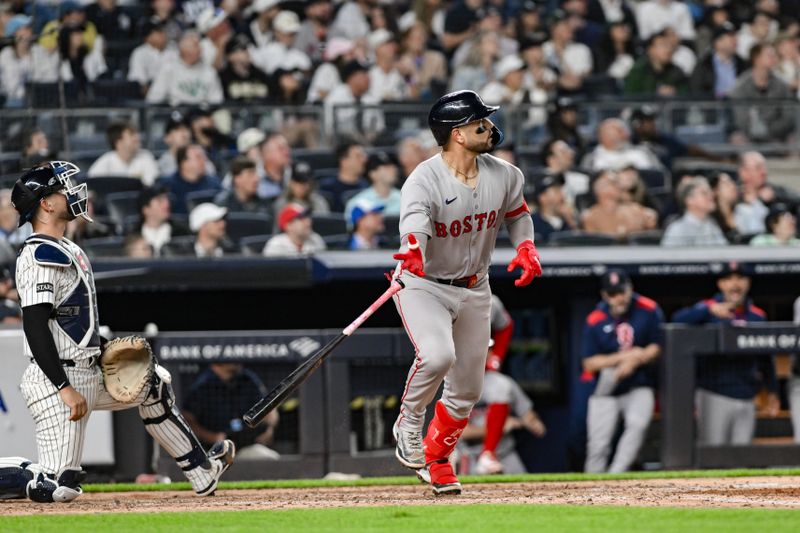 Jun 8, 2025; Bronx, New York, USA; Boston Red Sox catcher Carlos Narváez (75) hits a three-run home run against the New York Yankees during the sixth inning at Yankee Stadium. Mandatory Credit: John Jones-Imagn Images