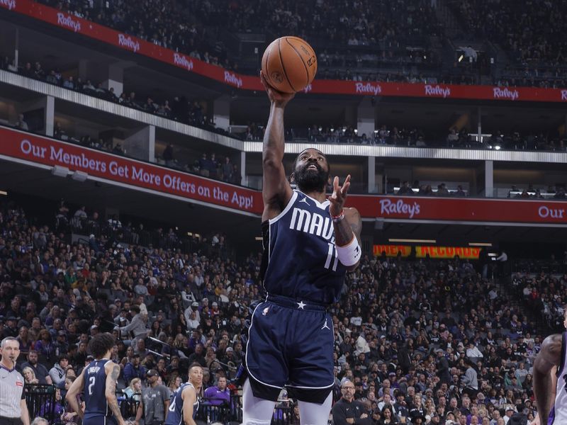 SACRAMENTO, CA - MARCH 29:  Kyrie Irving #11 of the Dallas Mavericks goes to the basket during the game on March 29, 2024 at Golden 1 Center in Sacramento, California. NOTE TO USER: User expressly acknowledges and agrees that, by downloading and or using this Photograph, user is consenting to the terms and conditions of the Getty Images License Agreement. Mandatory Copyright Notice: Copyright 2024 NBAE (Photo by Rocky Widner/NBAE via Getty Images)