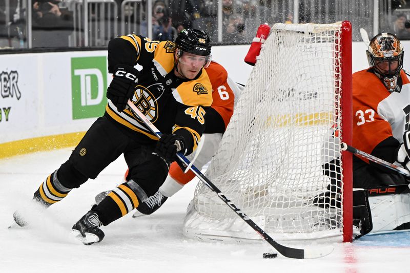 Oct 1, 2024; Boston, Massachusetts, USA; Boston Bruins left wing Cole Koepke (45) skates against Philadelphia Flyers goaltender Samuel Ersson (33) during the third period at the TD Garden. Mandatory Credit: Brian Fluharty-Imagn Images