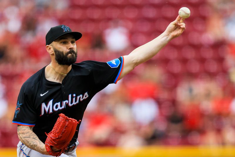 Jul 14, 2024; Cincinnati, Ohio, USA; Miami Marlins relief pitcher Tanner Scott (66) pitches against the Cincinnati Reds in the ninth inning at Great American Ball Park. Mandatory Credit: Katie Stratman-USA TODAY Sports