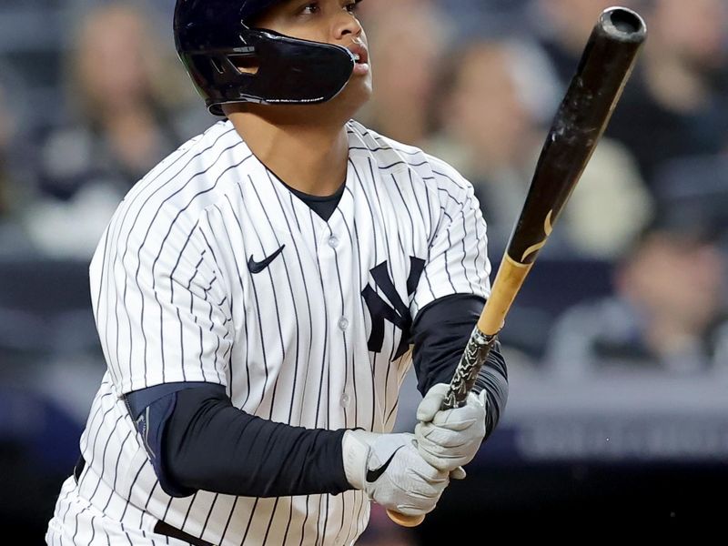 May 3, 2023; Bronx, New York, USA; New York Yankees designated hitter Willie Calhoun (24) watches his solo home run against the Cleveland Guardians during the fifth inning at Yankee Stadium. Mandatory Credit: Brad Penner-USA TODAY Sports