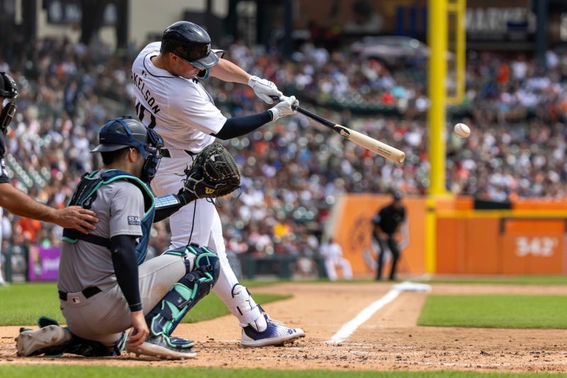 Aug 17, 2024; Detroit, Michigan, USA; Detroit Tigers first baseman Spencer Torkelson (20) hits a double in the second inning against the New York Yankees at Comerica Park. Mandatory Credit: David Reginek-USA TODAY Sports