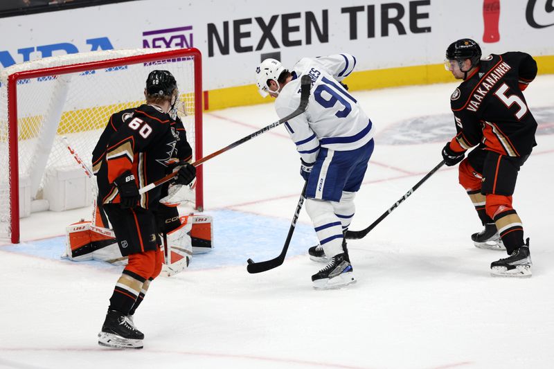 Jan 3, 2024; Anaheim, California, USA; Toronto Maple Leafs center John Tavares (91) scores a goal during the third period against the Anaheim Ducks at Honda Center. Mandatory Credit: Kiyoshi Mio-USA TODAY Sports