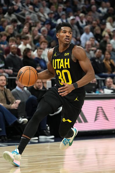 MINNEAPOLIS, MN -  NOVEMBER 30 :  Ochai Agbaji #30 of the Utah Jazz handles the ball during the game against the Minnesota Timberwolves on November 30, 2023 at Target Center in Minneapolis, Minnesota. NOTE TO USER: User expressly acknowledges and agrees that, by downloading and or using this Photograph, user is consenting to the terms and conditions of the Getty Images License Agreement. Mandatory Copyright Notice: Copyright 2023 NBAE (Photo by Jordan Johnson/NBAE via Getty Images)