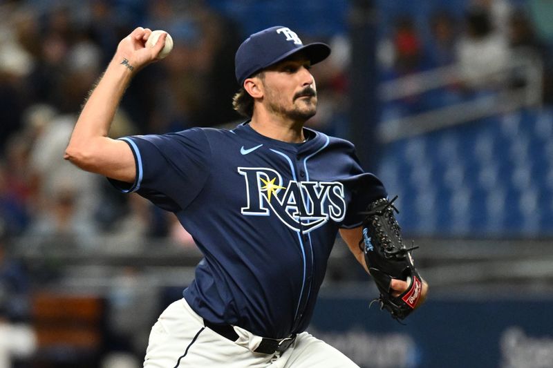 Jun 11, 2024; St. Petersburg, Florida, USA; Tampa Bay Rays starting pitcher Zach Eflin (24) throws a pitch in the first inning against the Chicago Cubs at Tropicana Field. Mandatory Credit: Jonathan Dyer-USA TODAY Sports