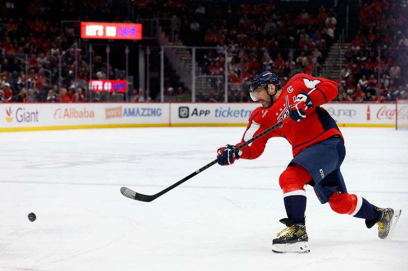Oct 19, 2025; Washington, District of Columbia, USA; Washington Capitals left wing Alex Ovechkin (8) shoots the puck against the Vancouver Canucks during the third period at Capital One Arena. Mandatory Credit: Geoff Burke-Imagn Images
