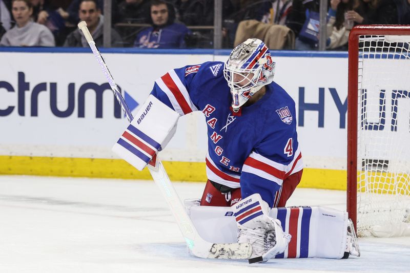 Jan 14, 2026; New York, New York, USA;  New York Rangers goaltender Spencer Martin (41) makes a save on a shot on goal attempt in the second period against the Ottawa Senators at Madison Square Garden. Mandatory Credit: Wendell Cruz-Imagn Images
