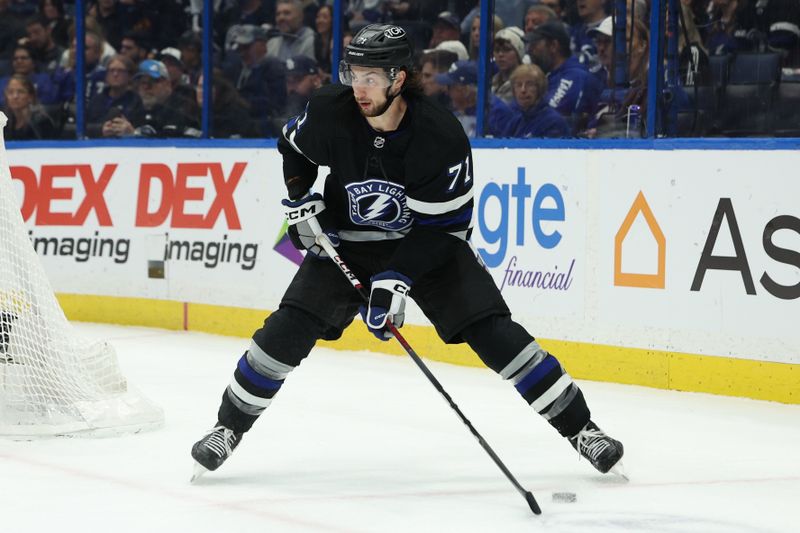 Feb 17, 2024; Tampa, Florida, USA;  Tampa Bay Lightning center Anthony Cirelli (71) controls the puck against the Florida Panthers in the first period at Amalie Arena. Mandatory Credit: Nathan Ray Seebeck-USA TODAY Sports