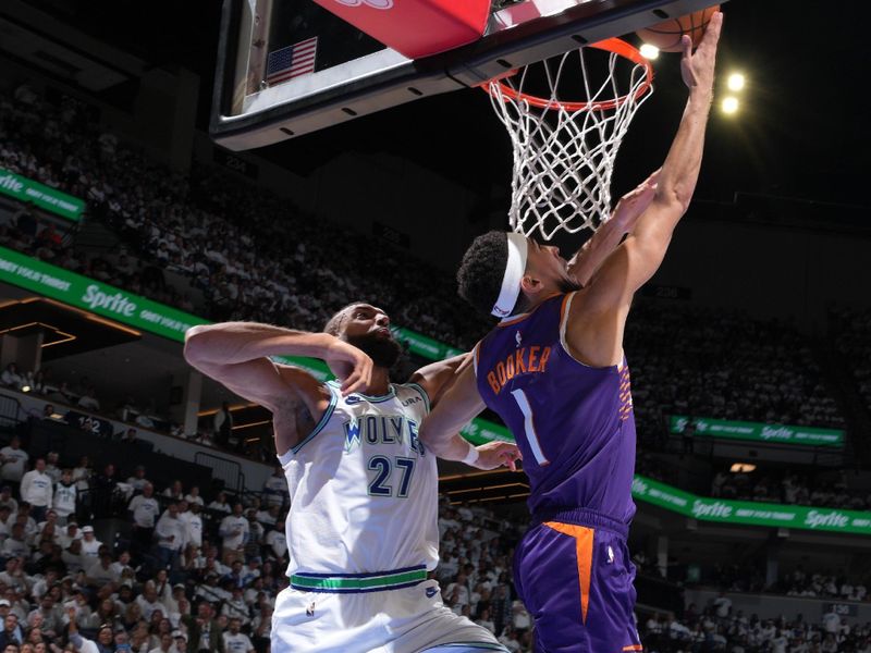 MINNEAPOLIS, MN -  APRIL 20: Devin Booker #1 of the Phoenix Suns drives to the basket during Round One Game One of the 2024 NBA Playoffs against the Minnesota Timberwolves on April 20, 2024 at Target Center in Minneapolis, Minnesota. NOTE TO USER: User expressly acknowledges and agrees that, by downloading and or using this Photograph, user is consenting to the terms and conditions of the Getty Images License Agreement. Mandatory Copyright Notice: Copyright 2024 NBAE (Photo by Jordan Johnson/NBAE via Getty Images)