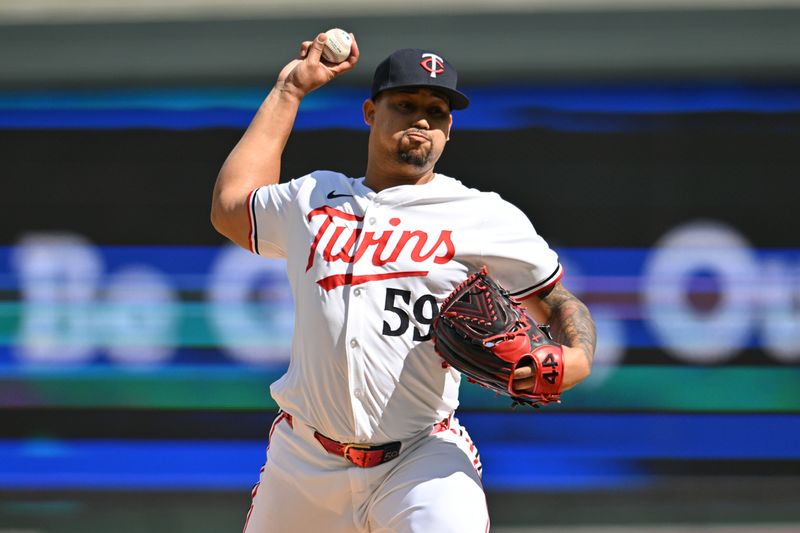 May 4, 2024; Minneapolis, Minnesota, USA; Minnesota Twins pitcher Jhoan Duran (59) throws a pitch against the Boston Red Sox during the eighth inning at Target Field. Mandatory Credit: Jeffrey Becker-USA TODAY Sports