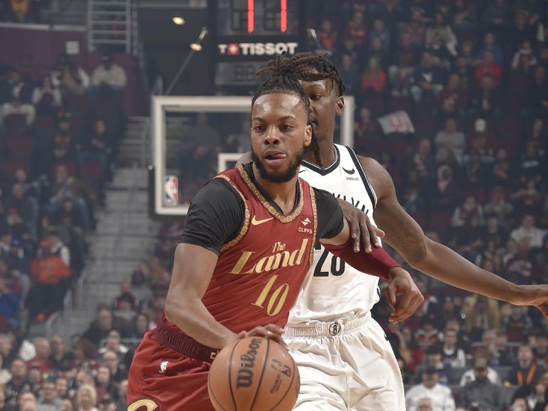 CLEVELAND, OH - MARCH 10: Darius Garland #10 of the Cleveland Cavaliers dribbles the ball during the game against the Brooklyn Nets on March 10, 2024 at Rocket Mortgage FieldHouse in Cleveland, Ohio. NOTE TO USER: User expressly acknowledges and agrees that, by downloading and/or using this Photograph, user is consenting to the terms and conditions of the Getty Images License Agreement. Mandatory Copyright Notice: Copyright 2024 NBAE (Photo by David Liam Kyle/NBAE via Getty Images)