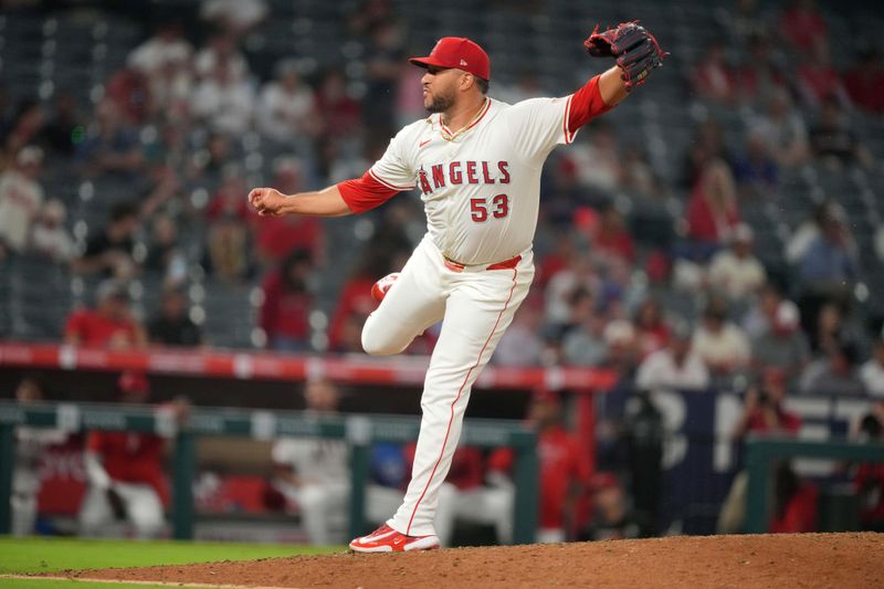 Jul 10, 2024; Anaheim, California, USA; Los Angeles Angels relief pitcher Carlos Estevez (53) throws in the ninth inning against the Texas Rangers at Angel Stadium. Mandatory Credit: Kirby Lee-USA TODAY Sports