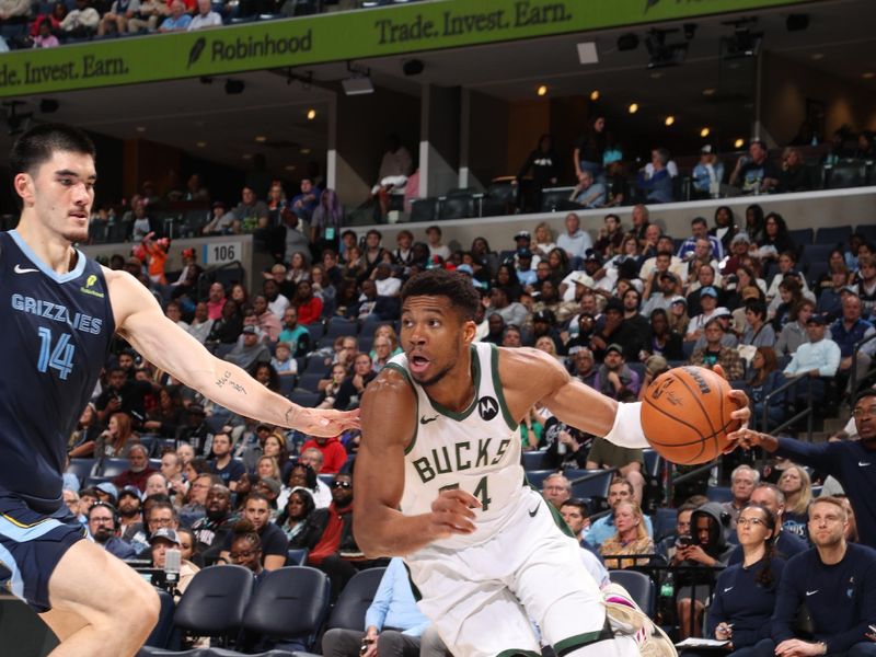 MEMPHIS, TN - OCTOBER 31: Giannis Antetokounmpo #34 of the Milwaukee Bucks drives to the basket during the game against the Memphis Grizzlies on October 31, 2024 at FedExForum in Memphis, Tennessee. NOTE TO USER: User expressly acknowledges and agrees that, by downloading and or using this photograph, User is consenting to the terms and conditions of the Getty Images License Agreement. Mandatory Copyright Notice: Copyright 2024 NBAE (Photo by Joe Murphy/NBAE via Getty Images)