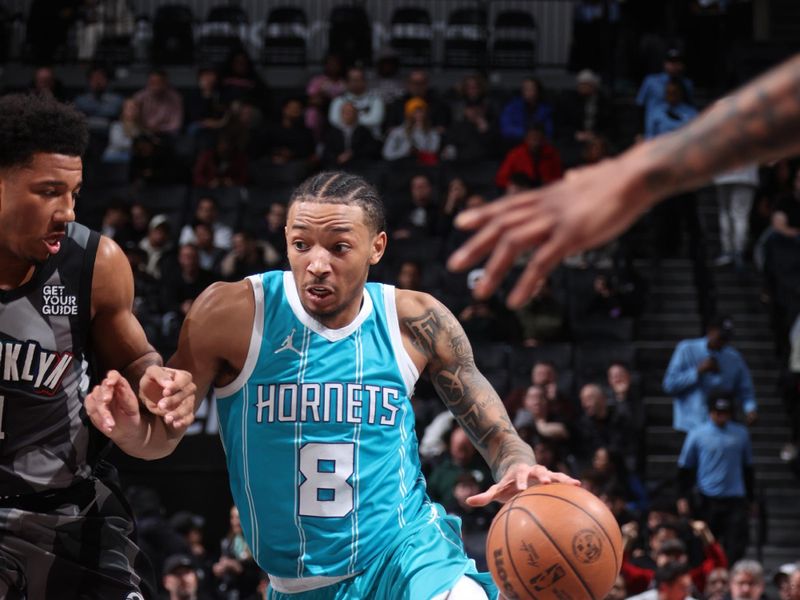 BROOKLYN, NY - FEBRUARY 10: Nick Smith Jr. #8 of the Charlotte Hornets dribbles the ball during the game against the Brooklyn Nets on February 10, 2025 at Barclays Center in Brooklyn, New York. NOTE TO USER: User expressly acknowledges and agrees that, by downloading and or using this Photograph, user is consenting to the terms and conditions of the Getty Images License Agreement. Mandatory Copyright Notice: Copyright 2025 NBAE (Photo by Nathaniel S. Butler/NBAE via Getty Images)