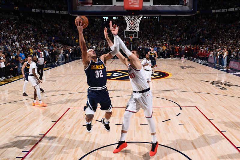 DENVER, CO - OCTOBER 26: Aaron Gordon #32 of the Denver Nuggets drives to the basket during the game against the LA Clippers on October 26, 2024 at the Ball Arena in Denver, Colorado. NOTE TO USER: User expressly acknowledges and agrees that, by downloading and/or using this Photograph, user is consenting to the terms and conditions of the Getty Images License Agreement. Mandatory Copyright Notice: Copyright 2024 NBAE (Photo by Garrett Ellwood/NBAE via Getty Images)