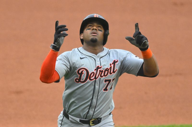 May 7, 2024; Cleveland, Ohio, USA; Detroit Tigers second baseman Andy Ibanez (77) celebrates his solo home run in the first inning against the Cleveland Guardians at Progressive Field. Mandatory Credit: David Richard-USA TODAY Sports
