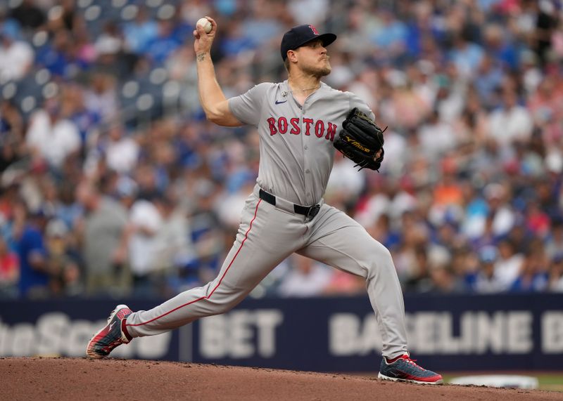 Jun 18, 2024; Toronto, Ontario, CAN; Boston Red Sox starting pitcher Tanner Houck (89) pitches to the Toronto Blue Jays during the first inning at Rogers Centre. Mandatory Credit: John E. Sokolowski-USA TODAY Sports