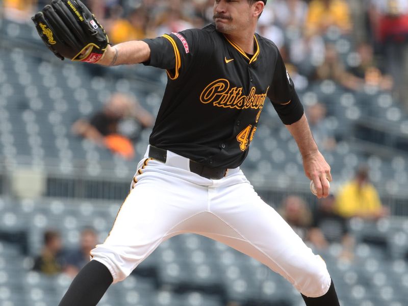 May 21, 2025; Pittsburgh, Pennsylvania, USA;  Pittsburgh Pirates starting pitcher Andrew Heaney (45) delivers a pitch against the Cincinnati Reds during the first inning at PNC Park. Mandatory Credit: Charles LeClaire-Imagn Images