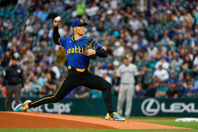 Sep 17, 2024; Seattle, Washington, USA; Seattle Mariners starting pitcher Bryan Woo (22) throws against the New York Yankees during the first inning at T-Mobile Park. Mandatory Credit: Joe Nicholson-Imagn Images