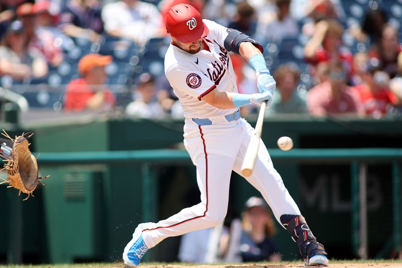 Jun 16, 2024; Washington, District of Columbia, USA; Washington Nationals outfielder Lane Thomas (28) hits a home run in the first inning during a game against the Miami Marlins at Nationals Park. Mandatory Credit: Daniel Kucin Jr.-USA TODAY Sports