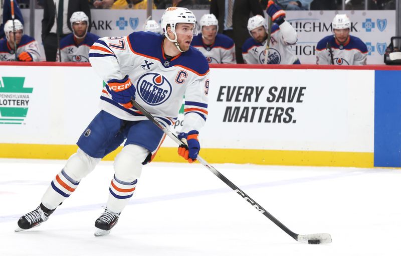 Dec 16, 2025; Pittsburgh, Pennsylvania, USA;  Edmonton Oilers center Connor McDavid (97) skates up ice with the puck against the Pittsburgh Penguins during the second period at PPG Paints Arena. Mandatory Credit: Charles LeClaire-Imagn Images