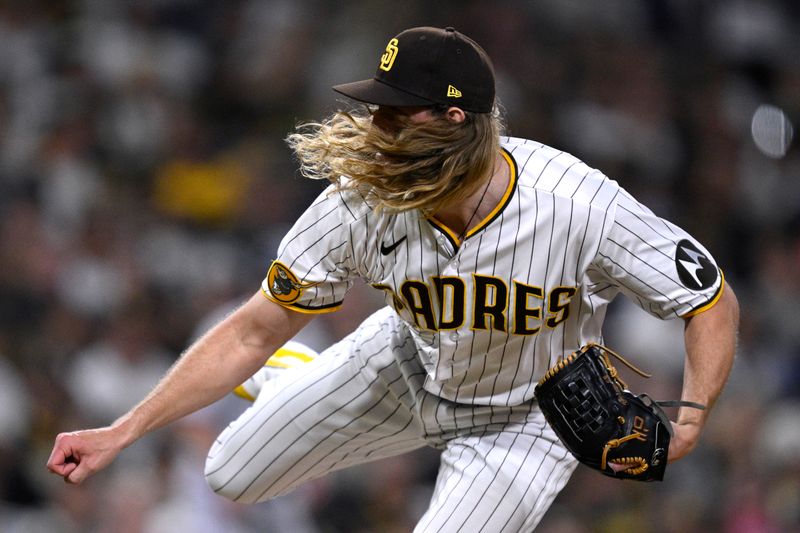 Aug 22, 2023; San Diego, California, USA; San Diego Padres relief pitcher Scott Barlow (58) throws a pitch against the Miami Marlins during the seventh inning at Petco Park. Mandatory Credit: Orlando Ramirez-USA TODAY Sports