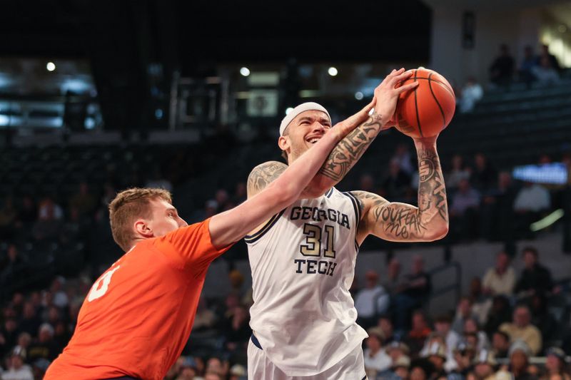 Jan 14, 2025; Atlanta, Georgia, USA; Clemson Tigers center Viktor Lakhin (0) fouls against Georgia Tech Yellow Jackets forward Duncan Powell (31) during the first half at McCamish Pavilion. Mandatory Credit: Jordan Godfree-Imagn Images