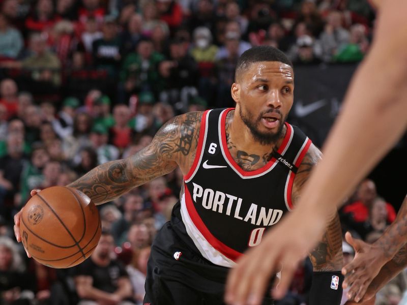 PORTLAND, OR - MARCH 17: Damian Lillard #0 of the Portland Trail Blazers dribbles the ball during the game against the Boston Celtics on March 17, 2023 at the Moda Center Arena in Portland, Oregon. NOTE TO USER: User expressly acknowledges and agrees that, by downloading and or using this photograph, user is consenting to the terms and conditions of the Getty Images License Agreement. Mandatory Copyright Notice: Copyright 2023 NBAE (Photo by Cameron Browne/NBAE via Getty Images)