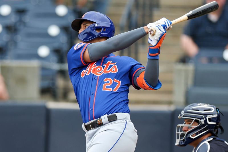 Mar 22, 2024; Tampa, Florida, USA;  New York Mets designated hitter Mark Vientos (27) hits a two run home run against the New York Yankees in the second inning at George M. Steinbrenner Field. Mandatory Credit: Nathan Ray Seebeck-USA TODAY Sports