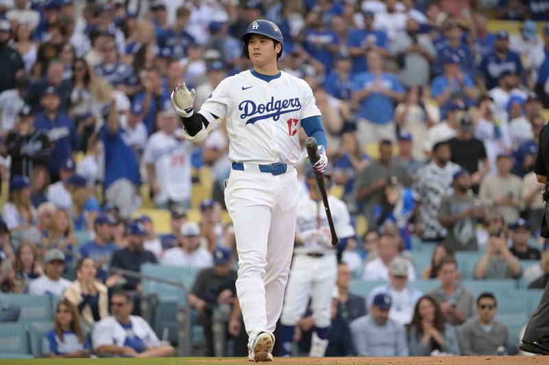 Oct 11, 2024; Los Angeles, California, USA; Los Angeles Dodgers designated hitter Shohei Ohtani (17) reacts at bat in the first inning against the San Diego Padres during game five of the NLDS for the 2024 MLB Playoffs at Dodger Stadium. Mandatory Credit: Jayne Kamin-Oncea-Imagn Images