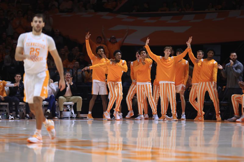 Jan 3, 2023; Knoxville, Tennessee, USA; The Tennessee Volunteers bench reacts after guard Santiago Vescovi (25) scored a three pointer against the Mississippi State Bulldogs during the first half at Thompson-Boling Arena. Mandatory Credit: Randy Sartin-USA TODAY Sports