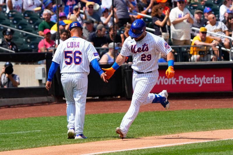 Aug 16, 2023; New York City, New York, USA; New York Mets third Base coach Joey Cora (56) congratulates right fielder DJ Steward (29) for hitting a home run as he rounds the bases against the Pittsburgh Pirates during the second inning at Citi Field. Mandatory Credit: Gregory Fisher-USA TODAY Sports