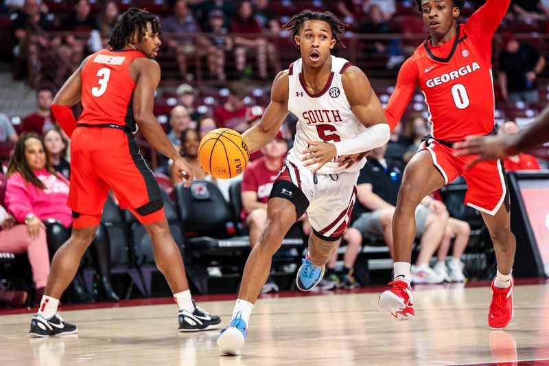 Mar 4, 2023; Columbia, South Carolina, USA; South Carolina Gamecocks guard Meechie Johnson (5) drives past Georgia Bulldogs guard Terry Roberts (0) in the first half at Colonial Life Arena. Mandatory Credit: Jeff Blake-USA TODAY Sports