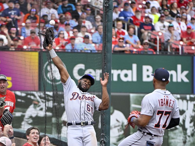 May 6, 2023; St. Louis, Missouri, USA;  Detroit Tigers left fielder Akil Baddoo (60) is unable to catch a foul ball hit b y St. Louis Cardinals right fielder Lars Nootbaar (not pictured) during the seventh inning at Busch Stadium. Mandatory Credit: Jeff Curry-USA TODAY Sports