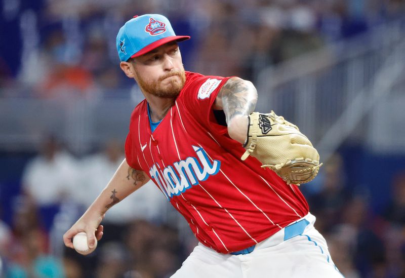 Sep 21, 2024; Miami, Florida, USA;  Miami Marlins starting pitcher Adam Oller (77) pitches against the Atlanta Braves in the first inning at loanDepot Park. Mandatory Credit: Rhona Wise-Imagn Images